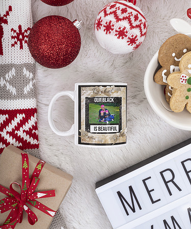 mockup-of-an-11-oz-mug-placed-on-a-christmas-decorated-surface-m43