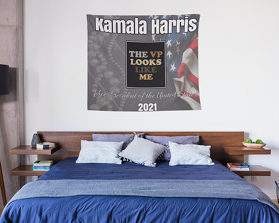 mockup-of-a-wall-tapestry-hanging-over-a-neat-bed-27396