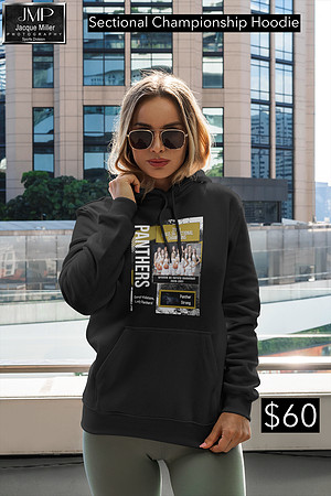 mockup-of-a-woman-with-a-pullover-hoodie-posing-by-a-tall-building-3549-el1